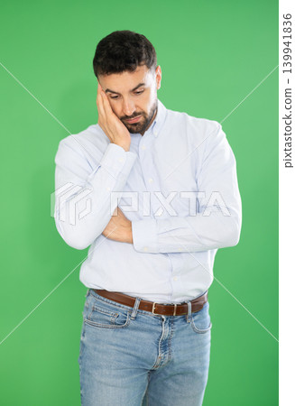 Man realizes something has been forgotten on green screen background Man realizes something has been forgotten on green screen background 139941836