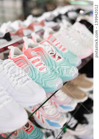 In shoe department stand womens trainers of latest summer collection In shoe department stand womens trainers of latest summer collection 139942012