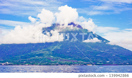 Beautiful sea view with Mount Jailolo in the background, West Halmahera, Indonesia Beautiful sea view with Mount Jailolo in the background, West Halmahera, Indonesia 139942866