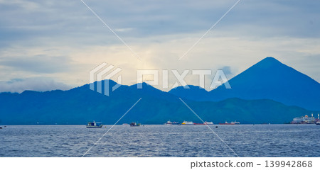 Beautiful sea view with Mount Jailolo in the background, West Halmahera, Indonesia Beautiful sea view with Mount Jailolo in the background, West Halmahera, Indonesia 139942868