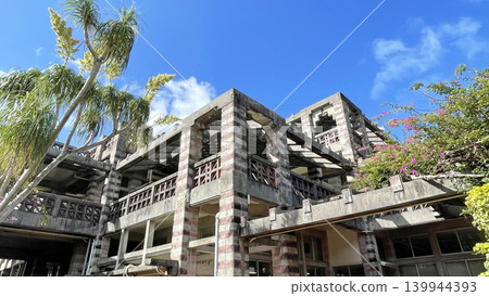 The unique concrete architecture of Nago City Hall in Okinawa Prefecture and the blue sky The unique concrete architecture of Nago City Hall in Okinawa Prefecture and the blue sky 139944393