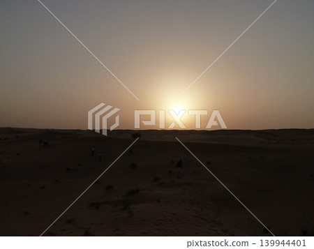 Sunset in the Dubai desert Sunset in the Dubai desert 139944401