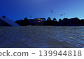 3DCG images of a tsunami/flood evacuation drill to higher ground and an evacuation tower; flooded, no people. 139944818