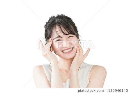 A beautiful Asian woman with flawless skin using skincare products (Beauty, skincare image) A beautiful Asian woman with flawless skin using skincare products (Beauty, skincare image) 139946140