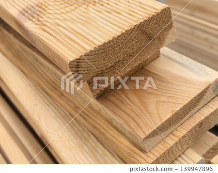 Macro Detail of Wood Grain and Growth Rings on a Timber Plank Macro Detail of Wood Grain and Growth Rings on a Timber Plank 139947896