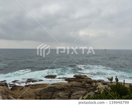 A landscape of a cloudy sky and the sea A landscape of a cloudy sky and the sea 139948799