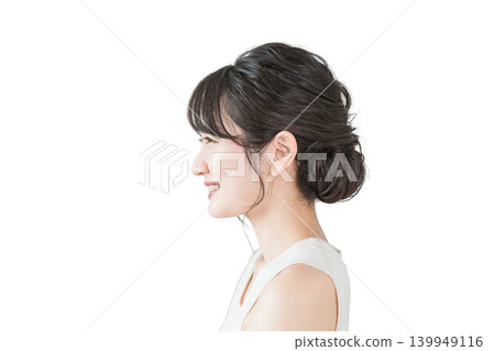 A beautiful Asian woman with a lovely smile and a striking profile (E-line, jawline). 139949116