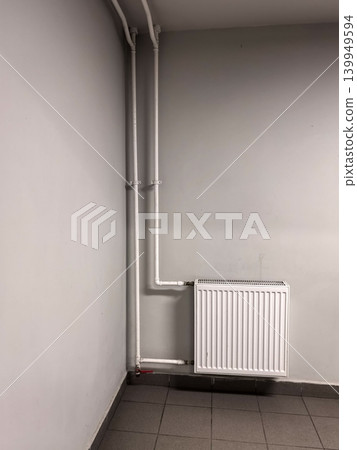 Central Heating System Unit with Radiator and Pipes 139949594