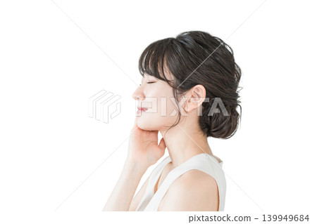 Profile of a beautiful Asian woman with flawless skin using skincare products (organic, additive-free) Profile of a beautiful Asian woman with flawless skin using skincare products (organic, additive-free) 139949684