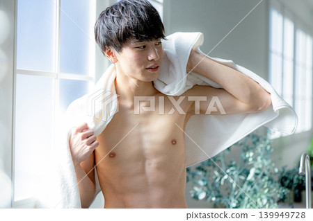 A young man relaxing naked A young man relaxing naked 139949728