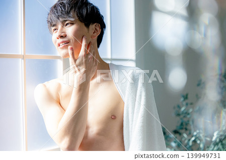 A young man relaxing naked A young man relaxing naked 139949731