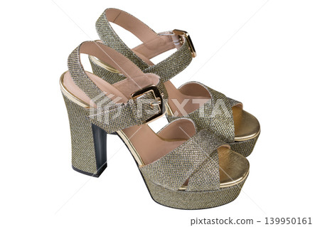 Women's golden glitter high heel platform sandals isolated on white background, side view Women's golden glitter high heel platform sandals isolated on white background, side view 139950161