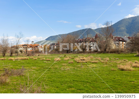 buildings in bansko, snowy pirin peaks in bulgaria buildings in bansko, snowy pirin peaks in bulgaria 139950975