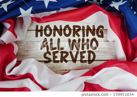 American flag with "Honoring All Who Served" on wooden background American flag with "Honoring All Who Served" on wooden background 139951034