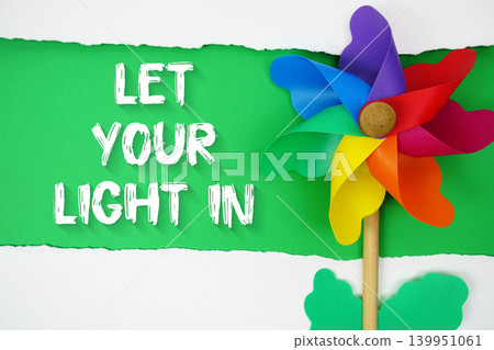 Let Your Light In motivational and inspirational quotes message on green background Let Your Light In motivational and inspirational quotes message on green background 139951061