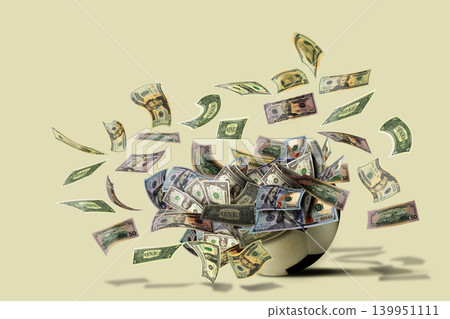 Flying US Dollar Bills Bursting from a Soccer Ball - Sports Finance Concept Flying US Dollar Bills Bursting from a Soccer Ball - Sports Finance Concept 139951111