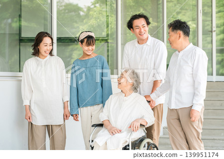 A three-generation family visiting a hospital or nursing home A three-generation family visiting a hospital or nursing home 139951174