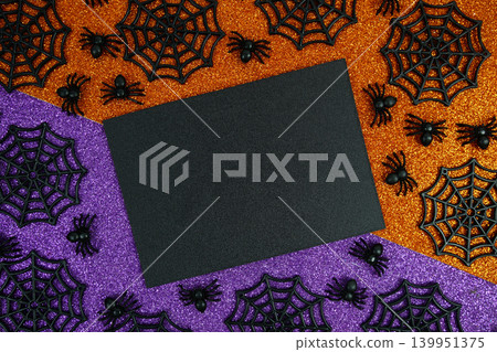 Glitter Halloween card mockup with Spiders and Webs in Orange and Purple Theme Glitter Halloween card mockup with Spiders and Webs in Orange and Purple Theme 139951375