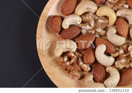 Close-up of mixed nuts served on a plate Close-up of mixed nuts served on a plate 139952210