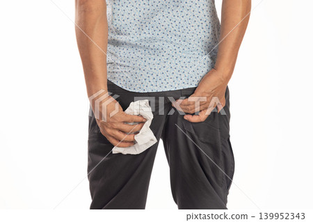 Hemorrhoidal pain, man with hemorrhoids on white background. Hemorrhoidal pain, man with hemorrhoids on white background. 139952343
