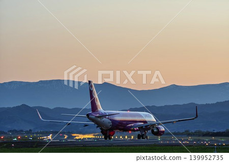 Sendai Airport at dusk, plane taxiing, Natori City, Miyagi Prefecture 139952735
