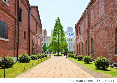A path through the historic red brick buildings of Noritake Garden 1 A path through the historic red brick buildings of Noritake Garden 1 139952954