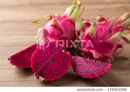 Fresh red dragon fruit on wooden background, Tropical fruit in summer season 139952996