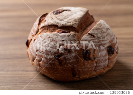 Cranberry sourdough bread on wooden background, Homemade bakery and healthy eating Cranberry sourdough bread on wooden background, Homemade bakery and healthy eating 139953026