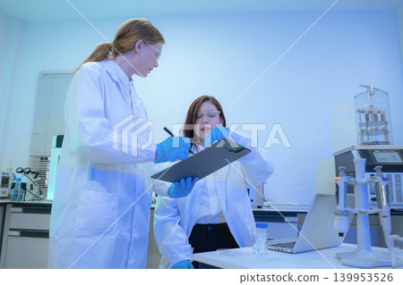 Diverse Scientists Conduct Biotechnology Research in Modern Laboratory 139953526