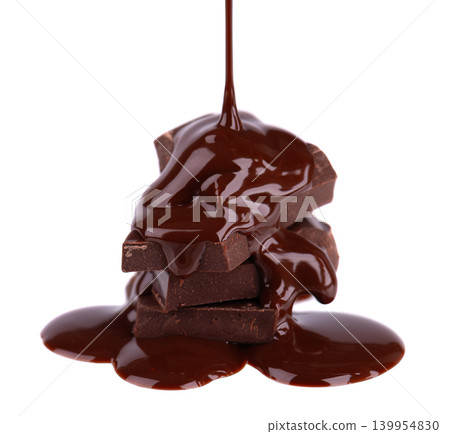 Liquid chocolate syrup pouring over a stack of chocolate pieces isolated on a white background. Clipping path. Liquid chocolate syrup pouring over a stack of chocolate pieces isolated on a white background. Clipping path. 139954830