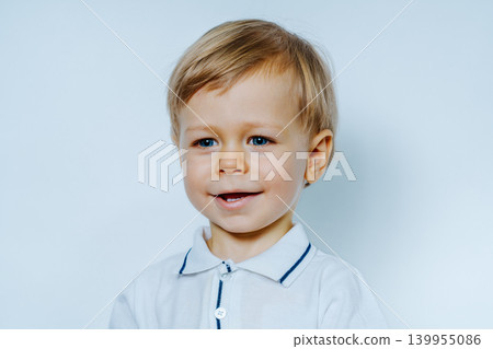 Portrait of a smiling two year child Portrait of a smiling two year child 139955086
