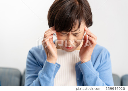Female headache Female headache 139956020