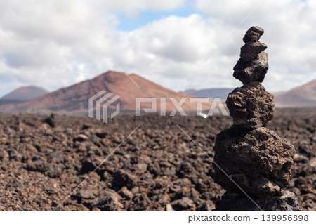 abstract sculpture made of volcanic stone in the national park of Timanfaya (Lanzarote, Spain) abstract sculpture made of volcanic stone in the national park of Timanfaya (Lanzarote, Spain) 139956898