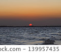 The African sun setting over the sea 139957435
