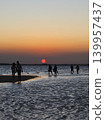 The African sun setting over the sea 139957437