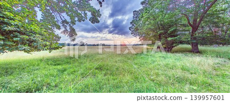 Sunset meadow landscape near Morfelden Walldorf Germany Sunset meadow landscape near Morfelden Walldorf Germany 139957601