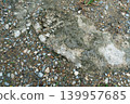 Rough Ground Texture with Cracked Concrete and Gravel 139957685