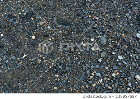 Dark Gravel and Crushed Stone Ground Texture Dark Gravel and Crushed Stone Ground Texture 139957687
