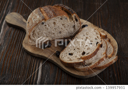 Rustic Olive Bread Presentation on Wood Background. Rustic Olive Bread Presentation on Wood Background. 139957931