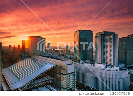 A stunning aerial photograph of Osaka Station against a clear sunset background, taken on a day with clear air. [Osaka Landscape Photography] 139957936