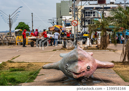 Santarem, Brazil - Dec 18, 2025: Boats docked at Santarem port along the banks of the Tapajos river in Santarem, Para, Brazil. Santarem, Brazil - Dec 18, 2025: Boats docked at Santarem port along the banks of the Tapajos river in Santarem, Para, Brazil. 139958166