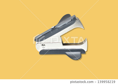 Black stationery staple remover. Black stationery staple remover. 139958219