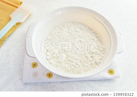 Flour in a container Flour in a container 139958322