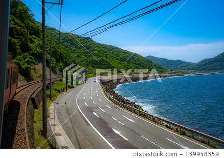 The Sea of Japan as seen from the window of a train on the San'in Line The Sea of Japan as seen from the window of a train on the San'in Line 139958359