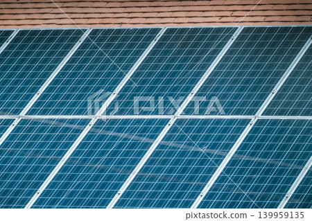 Residential houses with rooftop solar panels, renewable energy for sustainable homes 139959135