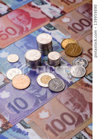 Money, currency of Canada, dollar banknotes of various denominations. Canadian money Money, currency of Canada, dollar banknotes of various denominations. Canadian money 139959890