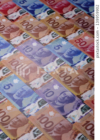 Money, currency of Canada, dollar banknotes of various denominations. Canadian money Money, currency of Canada, dollar banknotes of various denominations. Canadian money 139959902