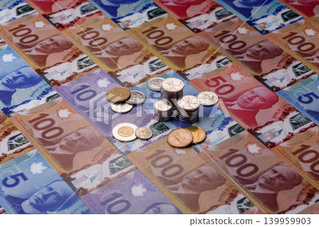 Money, currency of Canada, dollar banknotes of various denominations. Canadian money Money, currency of Canada, dollar banknotes of various denominations. Canadian money 139959903