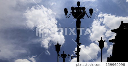 Street lamp on Tiananmen Square in Beijing, China (against the background of a beautiful sky with clouds), with propaganda or public announcement speakers 139960096