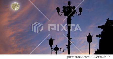 Street lamp on Tiananmen Square in Beijing, China (against the sunset with the super moon), with propaganda or public announcement speakers 139960306